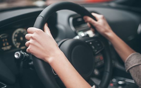 Hands on steering wheel
