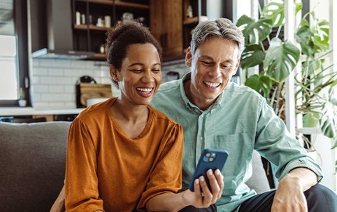 Couple looking at phone